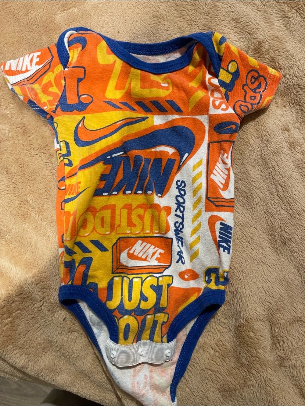 Nike Orange, Blue and Yellow 'Just Do It' Baby Bodysuit
